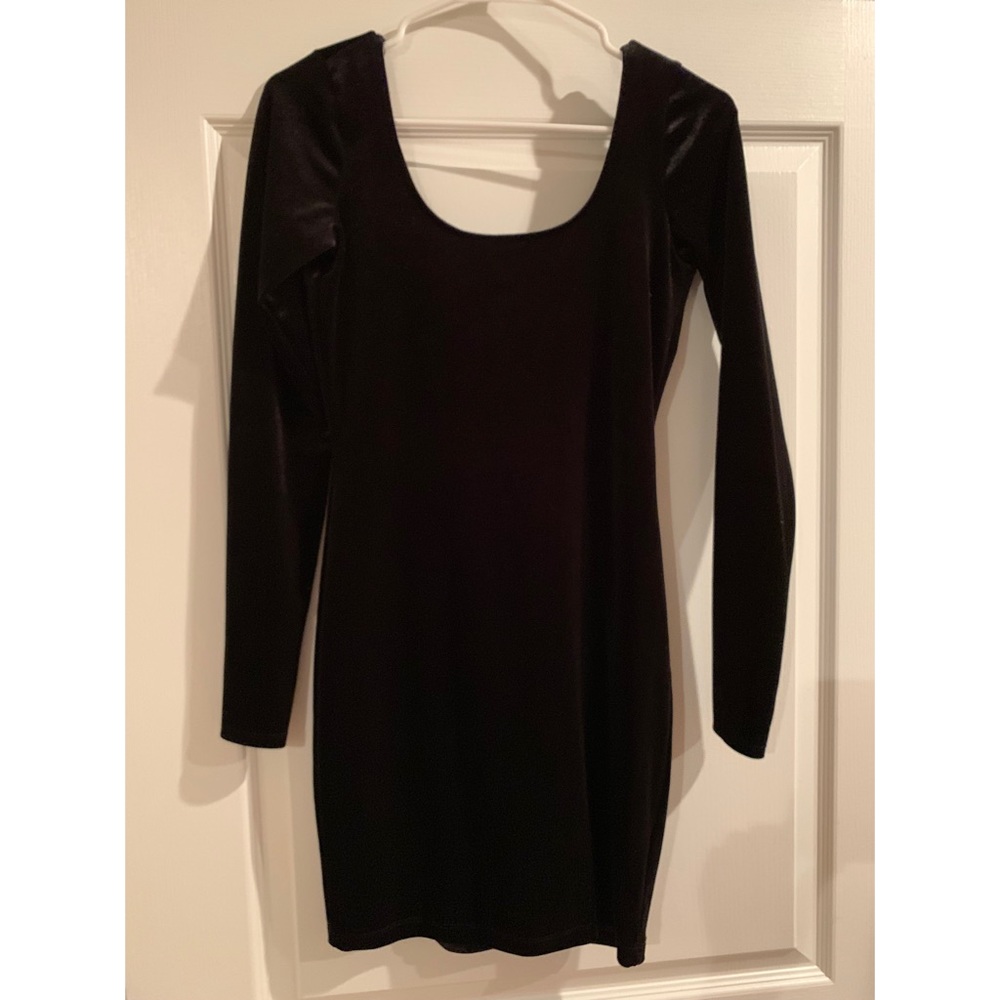 Tight black velvet dress